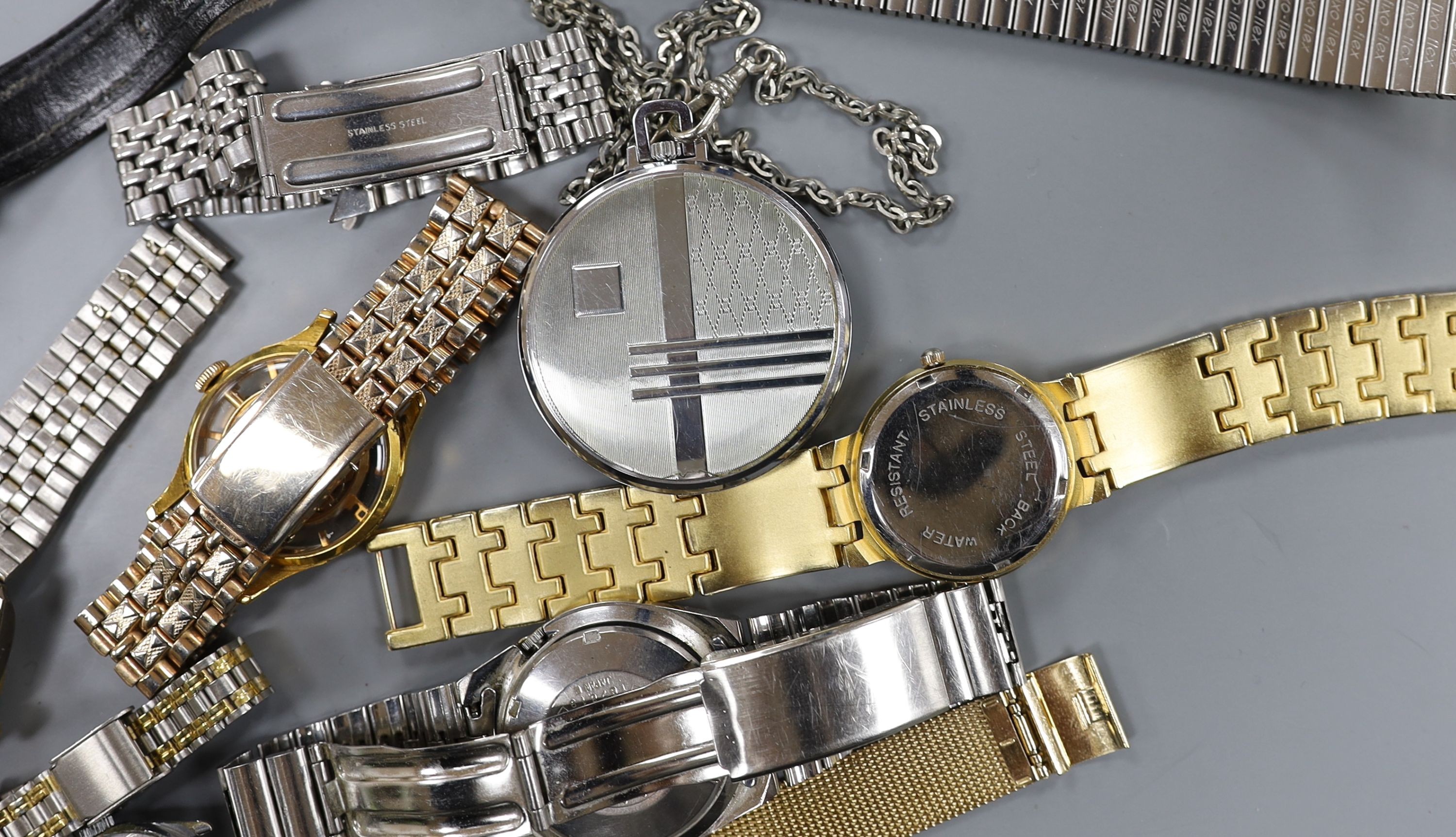 A gentleman's mid 20th century stainless steel Omega manual wrist watch, case diameter 35mm, on associated bracelet, together with eight other assorted wrist watches including Seiko and Silvan, an Oris pocket watch and t